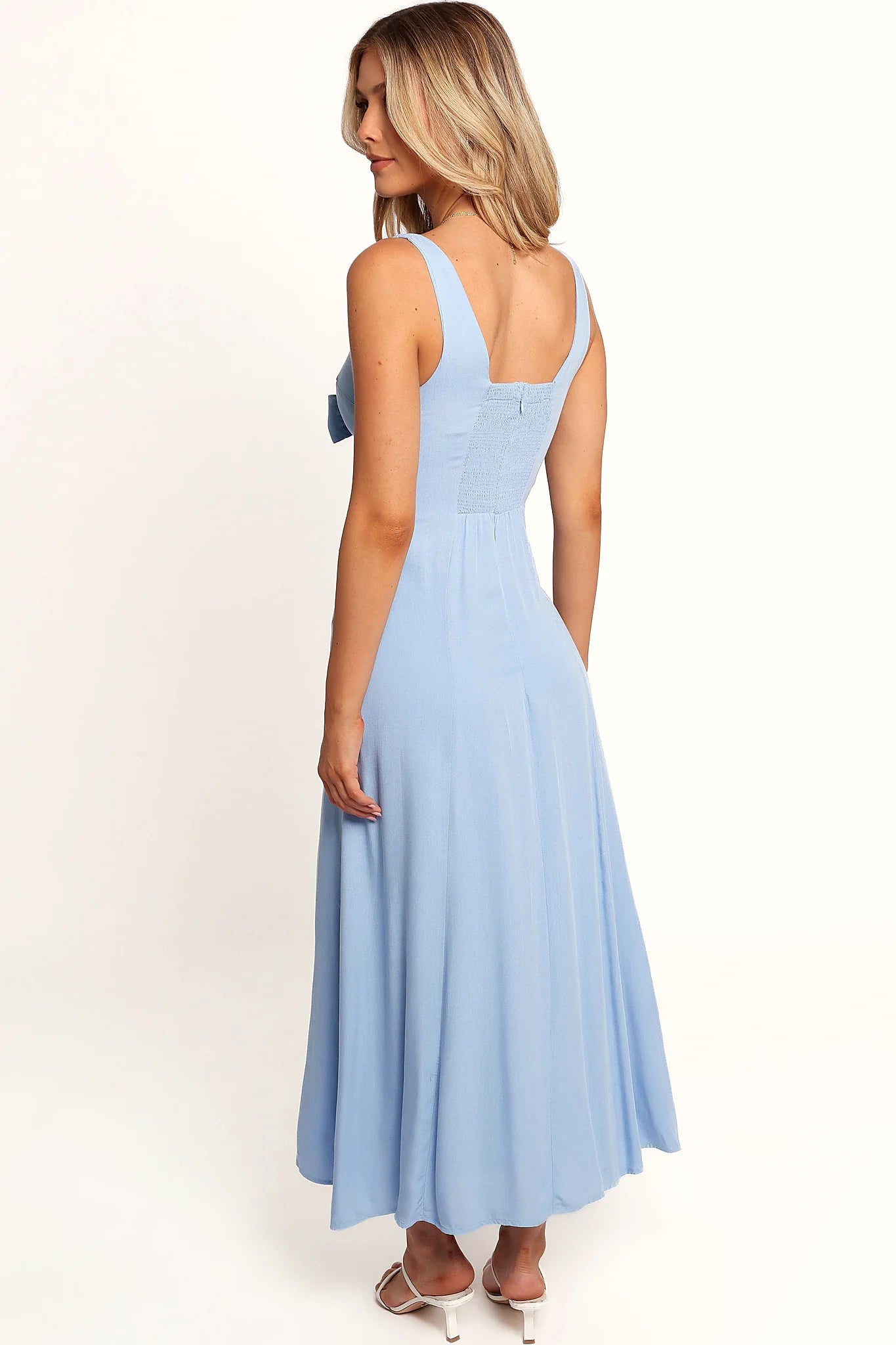 Close detail of the V neckline and fixed straps