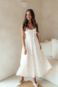Front view of a heart print cotton midi dress with a bust tie