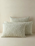 Group shot of sage botanical cotton shams in two sizes