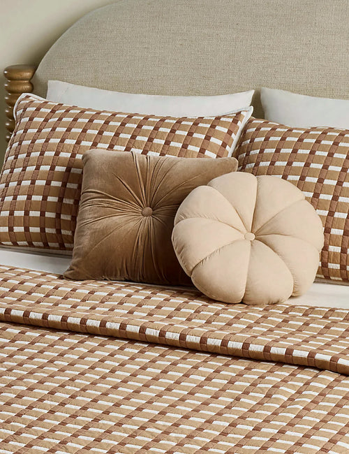 Blush gingham cotton quilt in queen size photographed flat