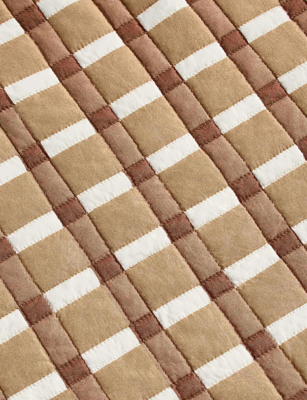 Second product view of a blush gingham cotton quilt in queen size