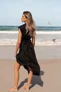 Front view of a black linen midi dress with a collared V neckline