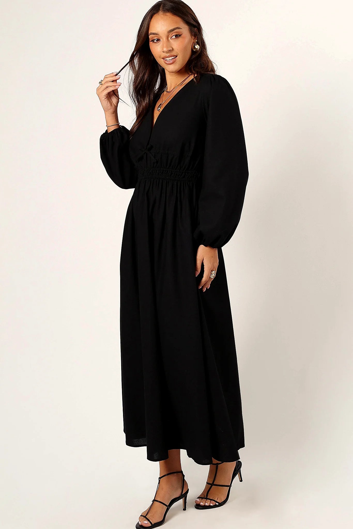 Back view of the long-sleeve linen maxi dress