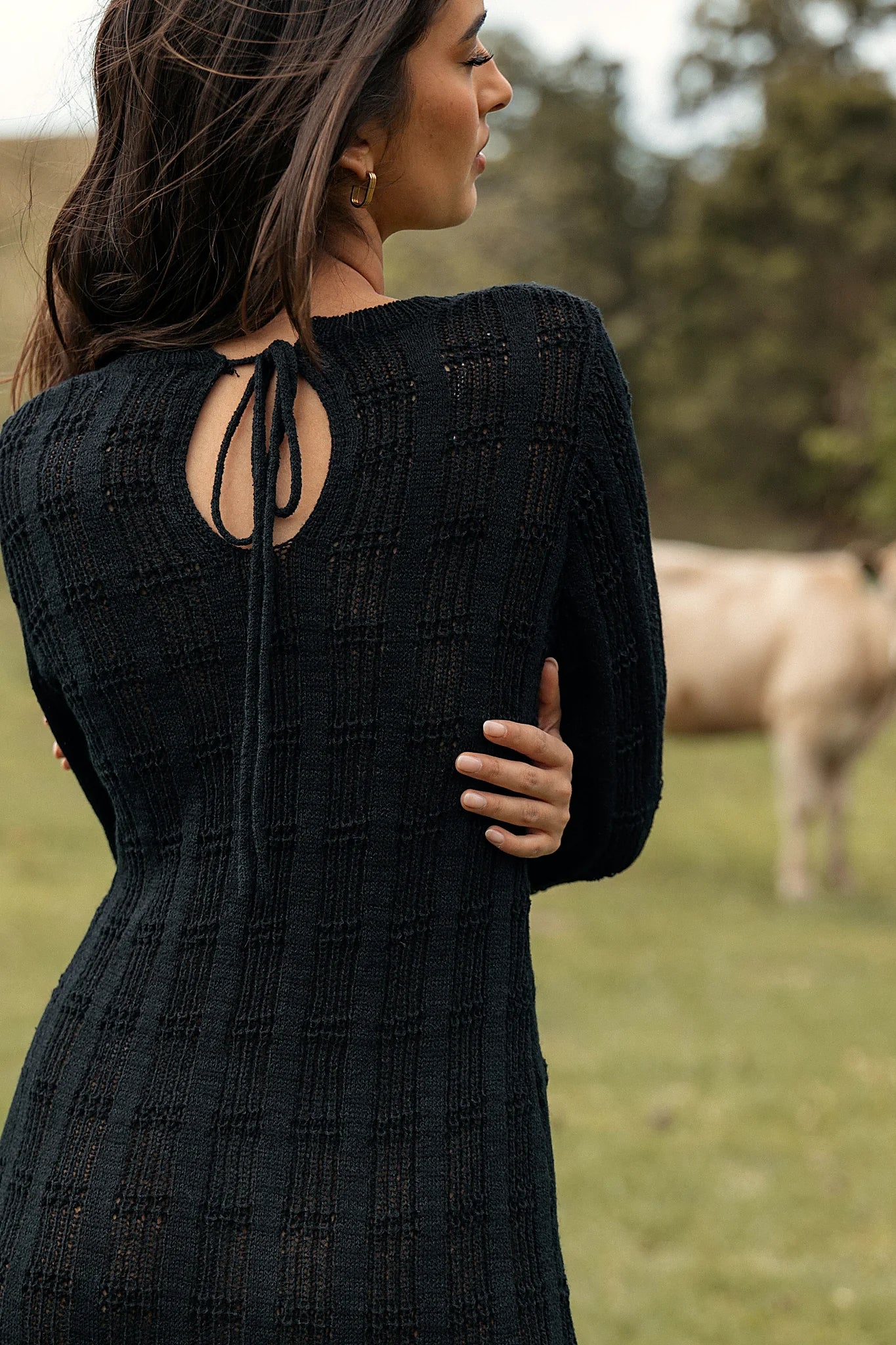 Side view showing the A-line skirt and frill hemline