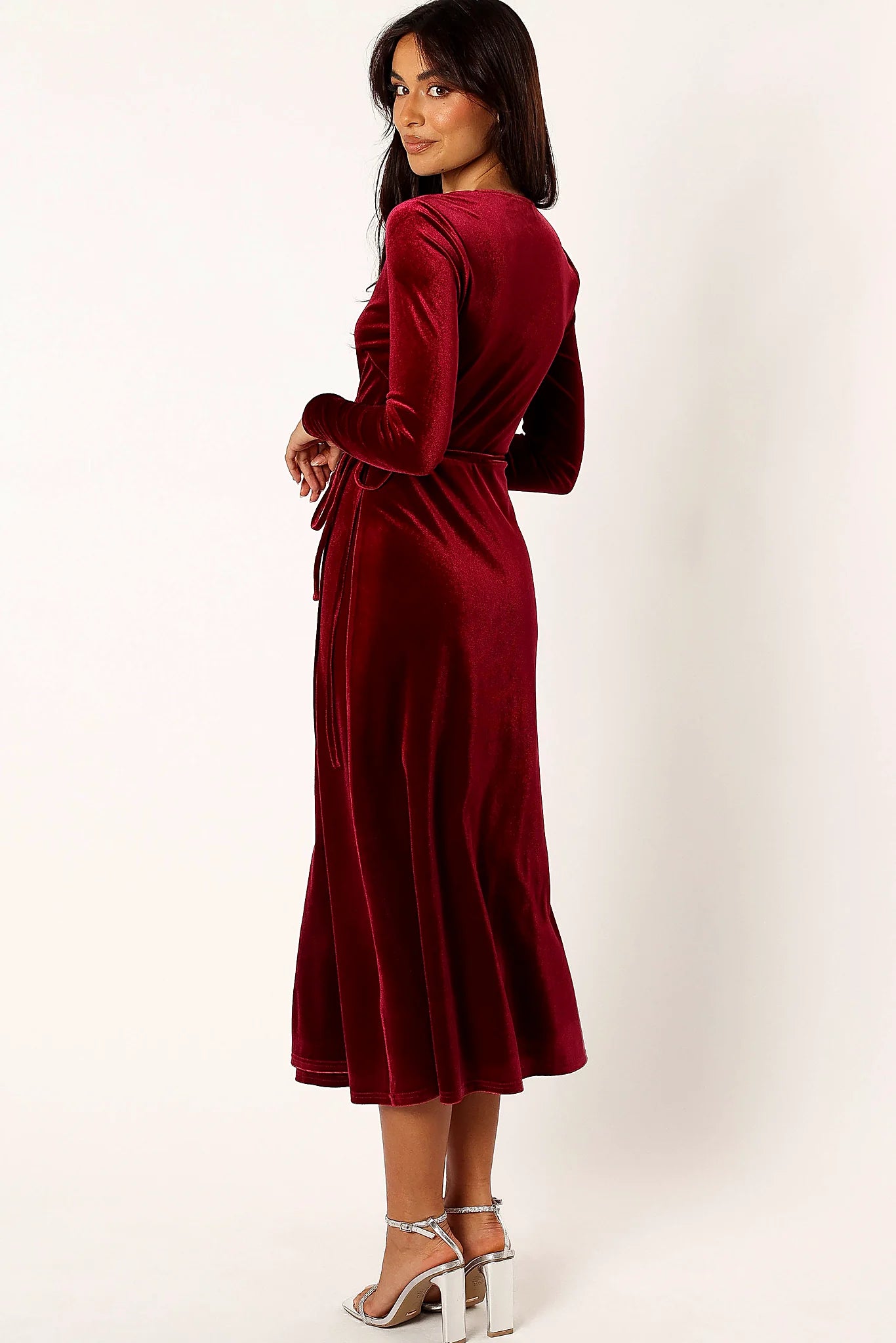 Back view of the long-sleeve wrap midi dress