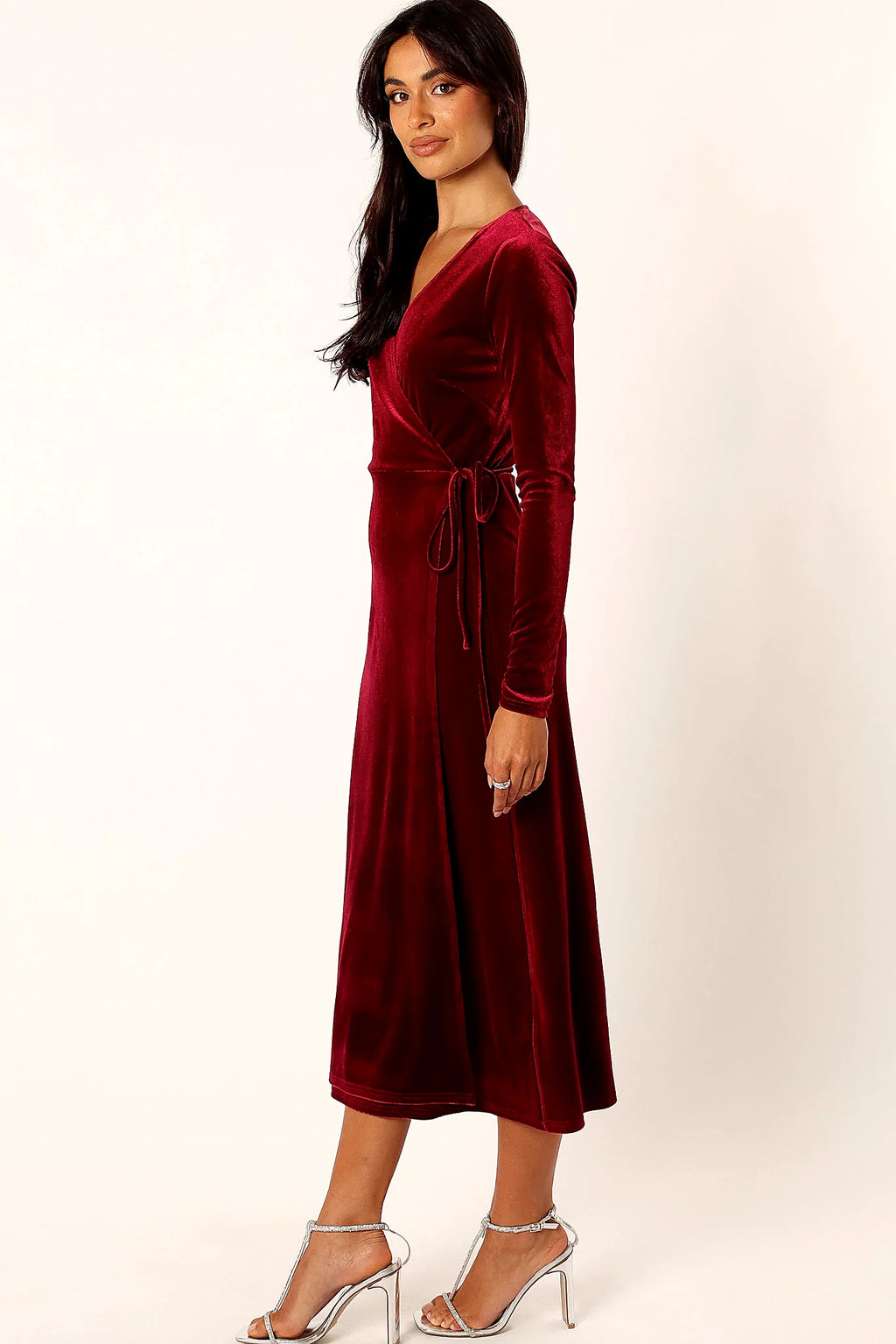 Side view showing the waist tie fastened through the side