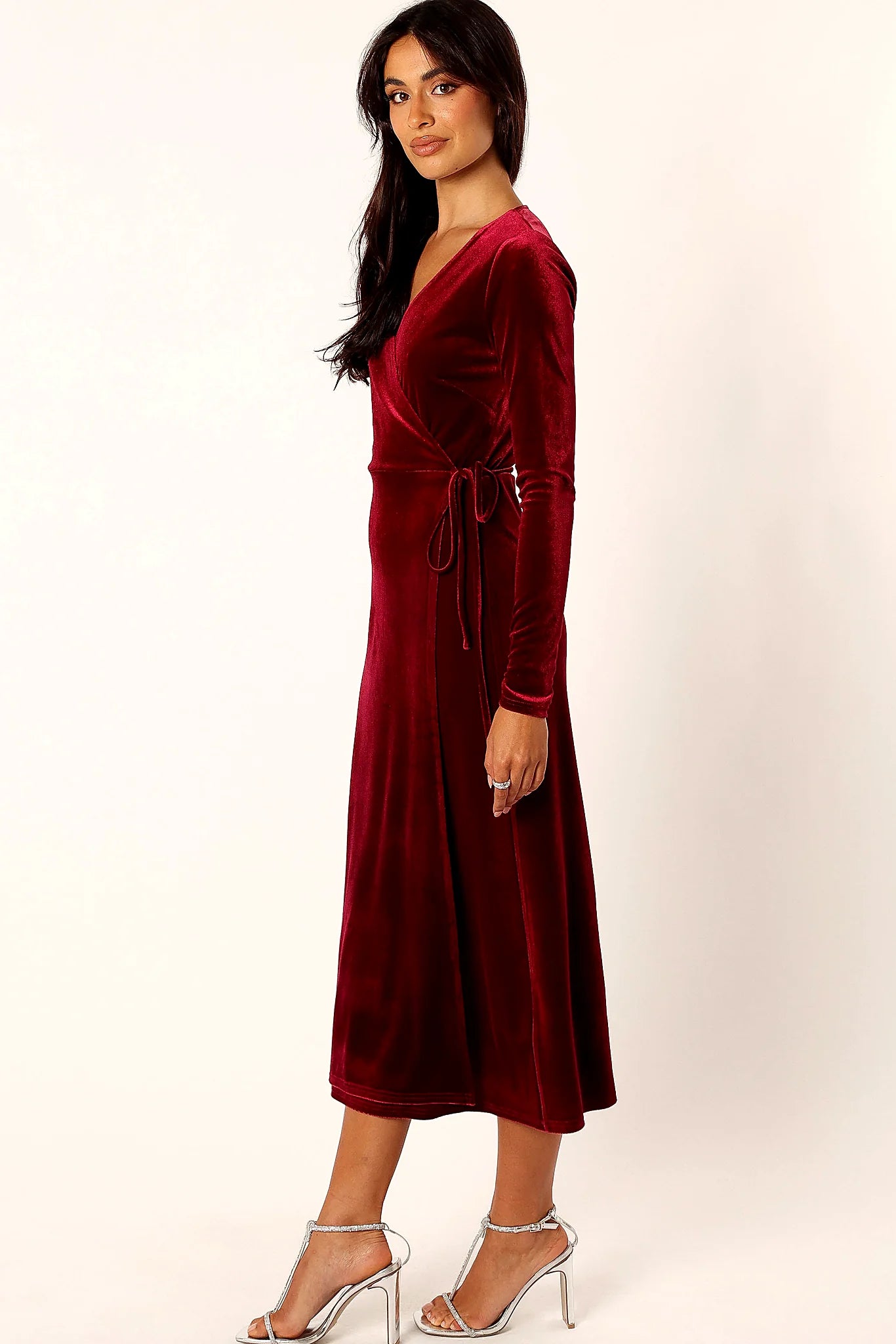 Side view showing the waist tie fastened through the side