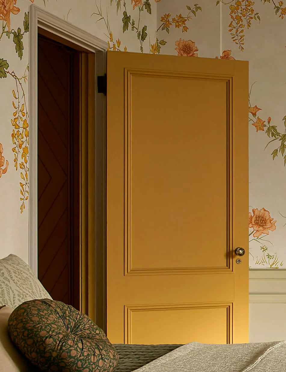 Second bedroom scene showing the coverlet as the top layer