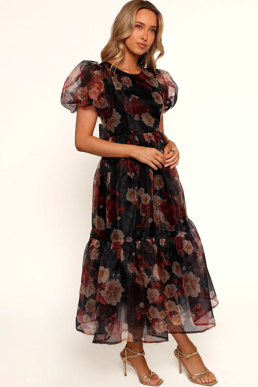 Close detail of the floral print overlay fabric