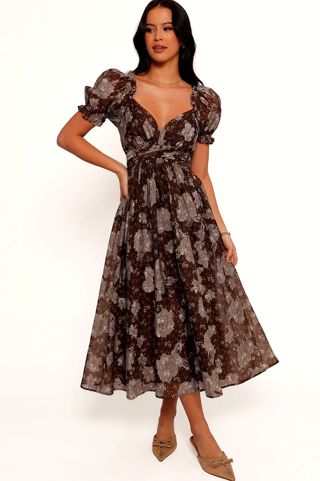 Side view of the empire waist and long floral skirt