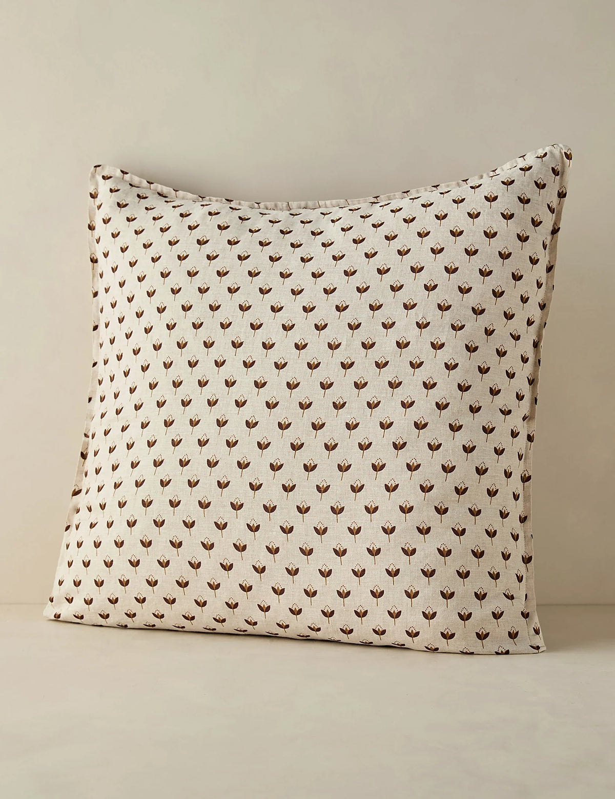 Euro size floral motif linen sham photographed flat