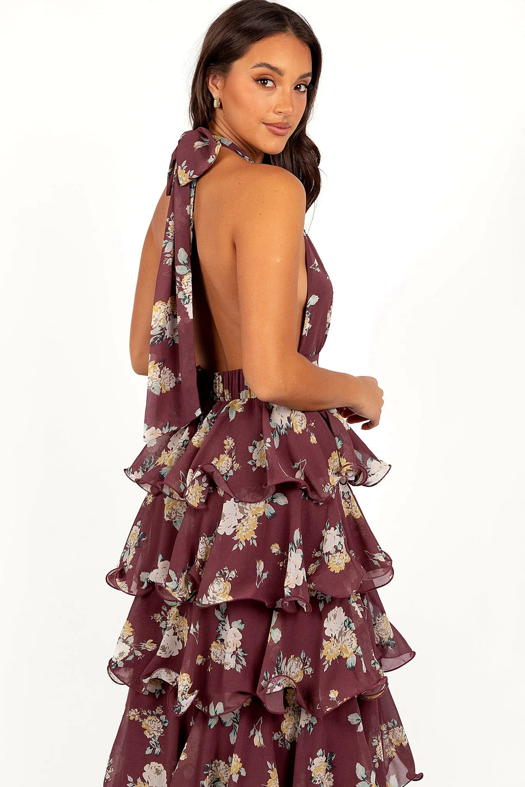 Back view showing the halter tie and open back design