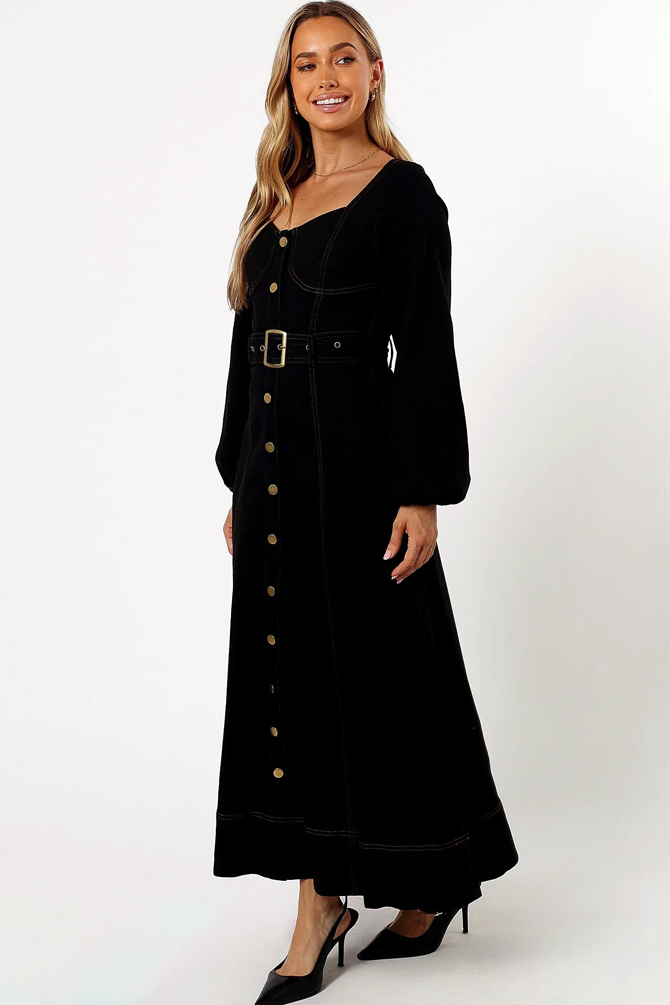 Side view showing the A-line skirt and contrast stitching