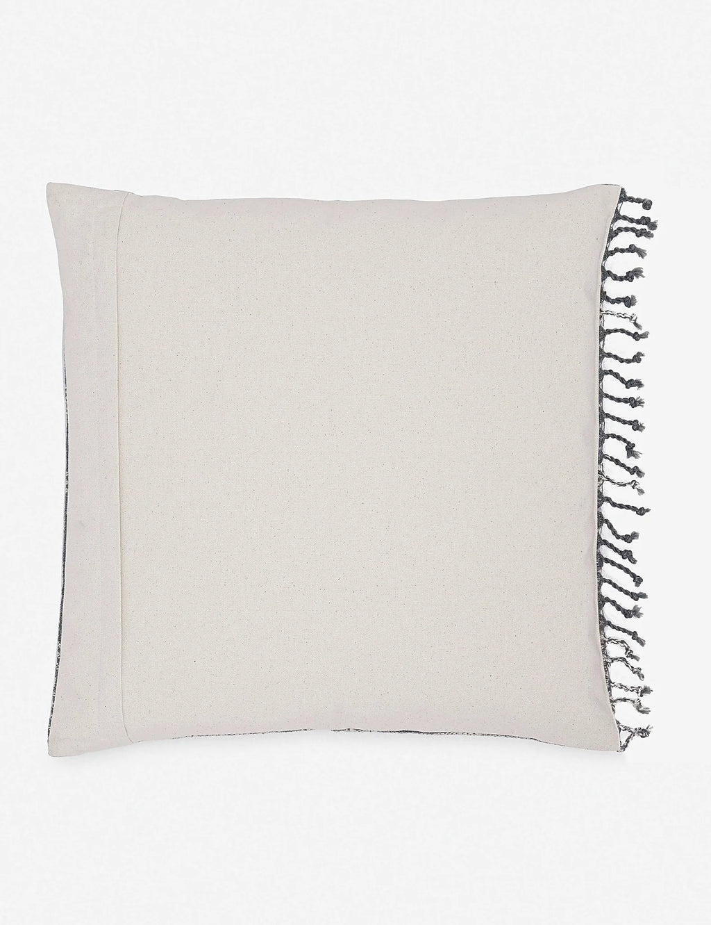 Angled view of the striped and geometric weave on a wool pillow