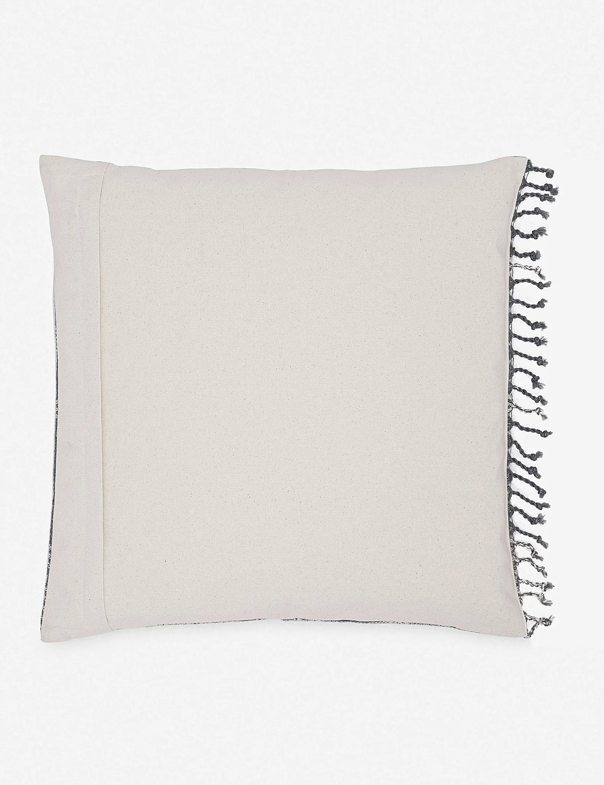 Angled view of the striped and geometric weave on a wool pillow