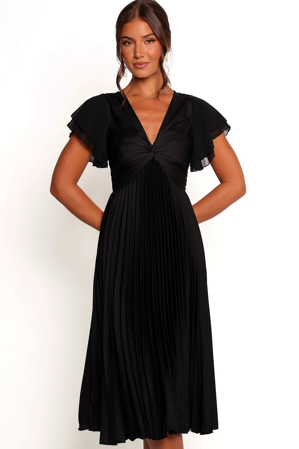 Side view showing the pleated skirt