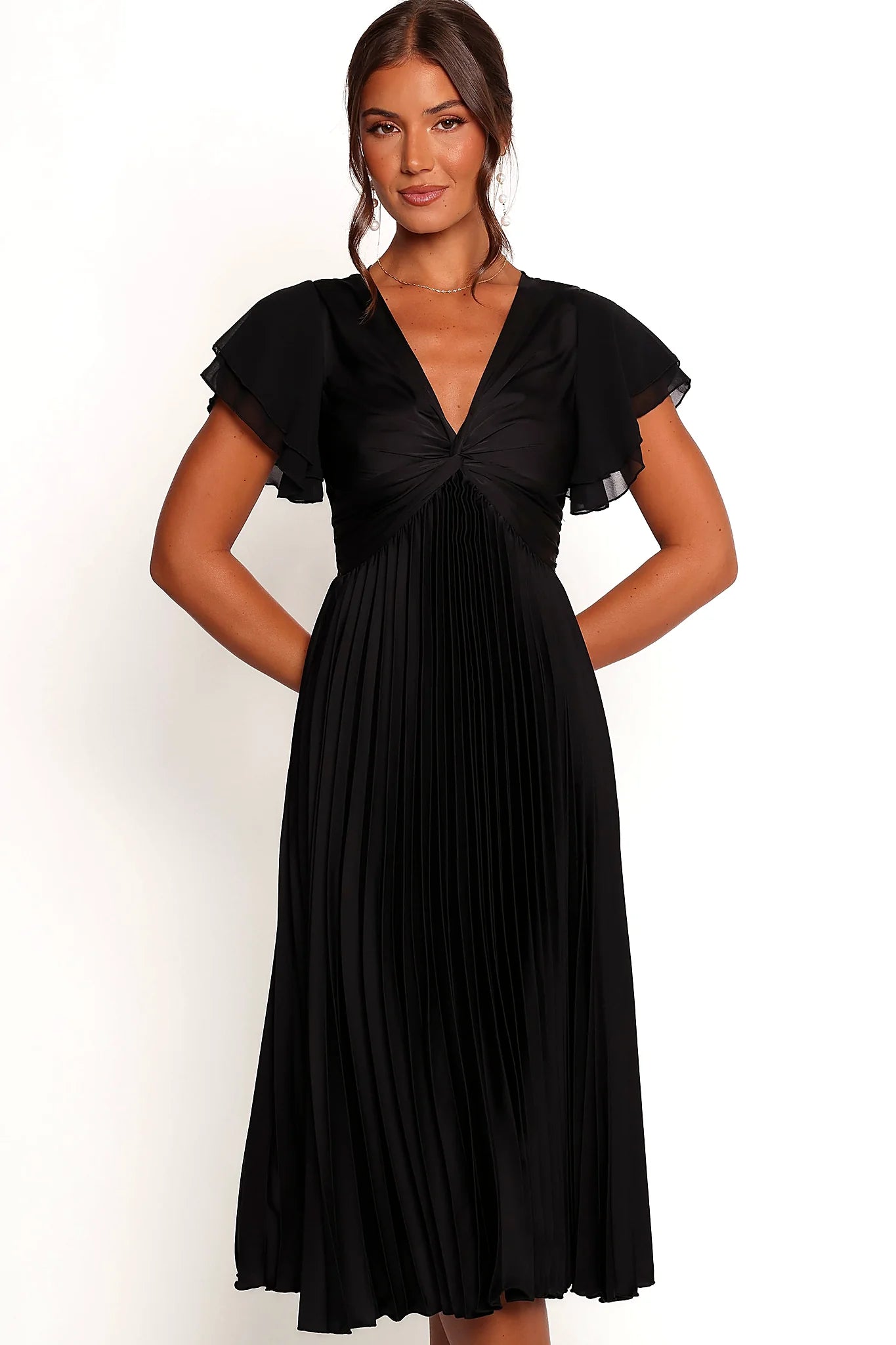 Side view showing the pleated skirt