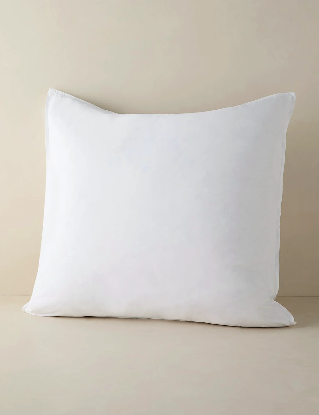 White percale sham in euro size photographed against a plain ground