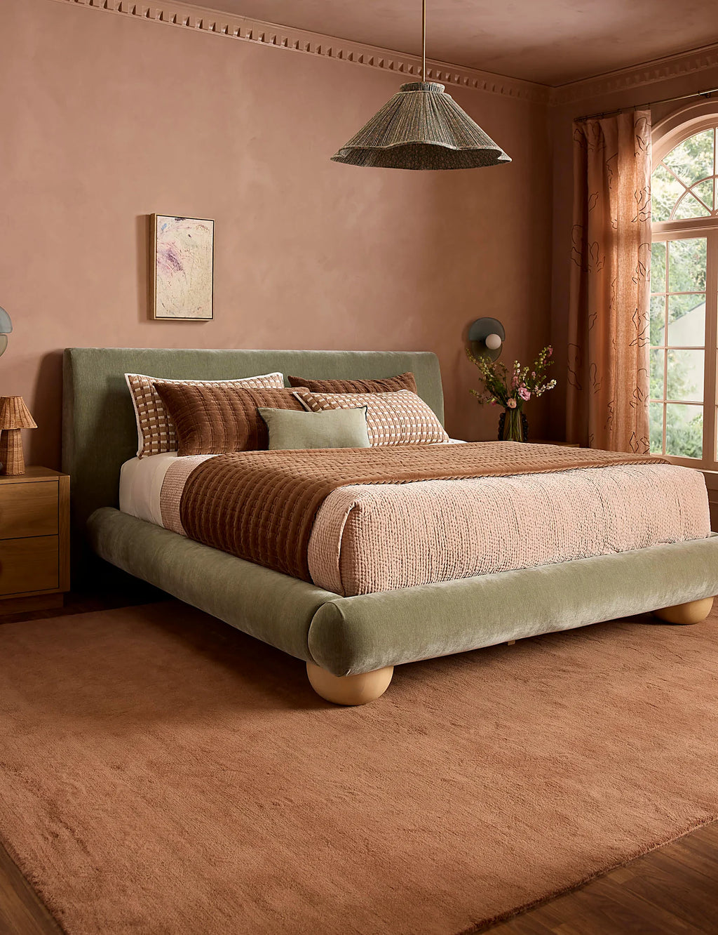 Spring bedding scene showing the sheet set layered under a cover