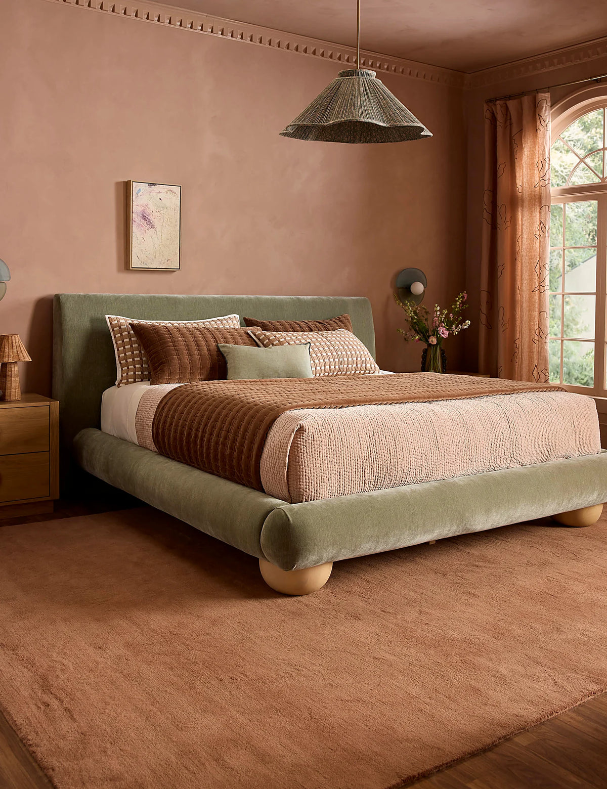 Spring bedding scene showing the sheet set layered under a cover