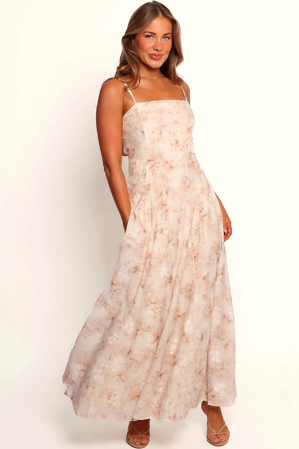Front view of a floral midi dress with a square neckline