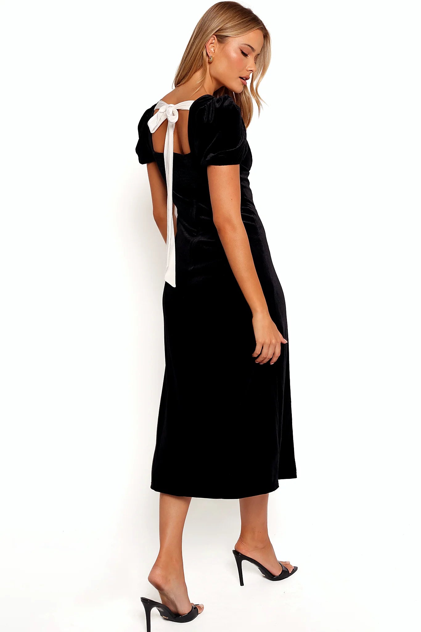 Back view showing the white tie close and shirred panel