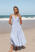 Front view of a light blue sleeveless maxi dress with a V neckline