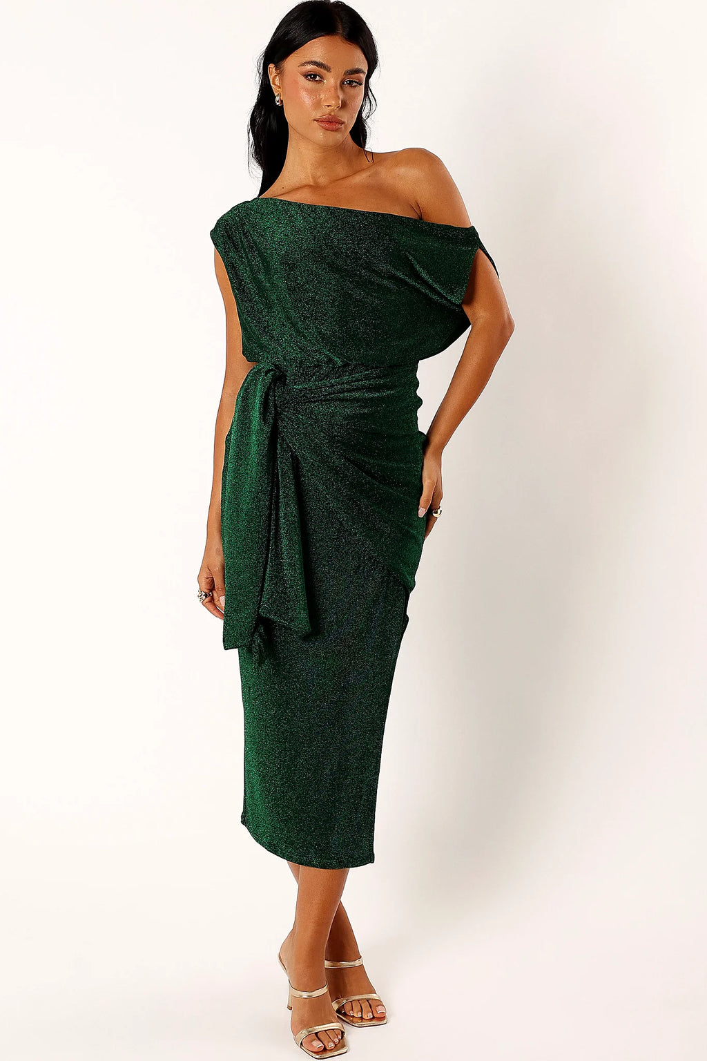 Front view of a green glitter midi dress with an asymmetric neckline