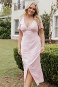 Front view of a pink cotton maxi dress with a deep V neckline