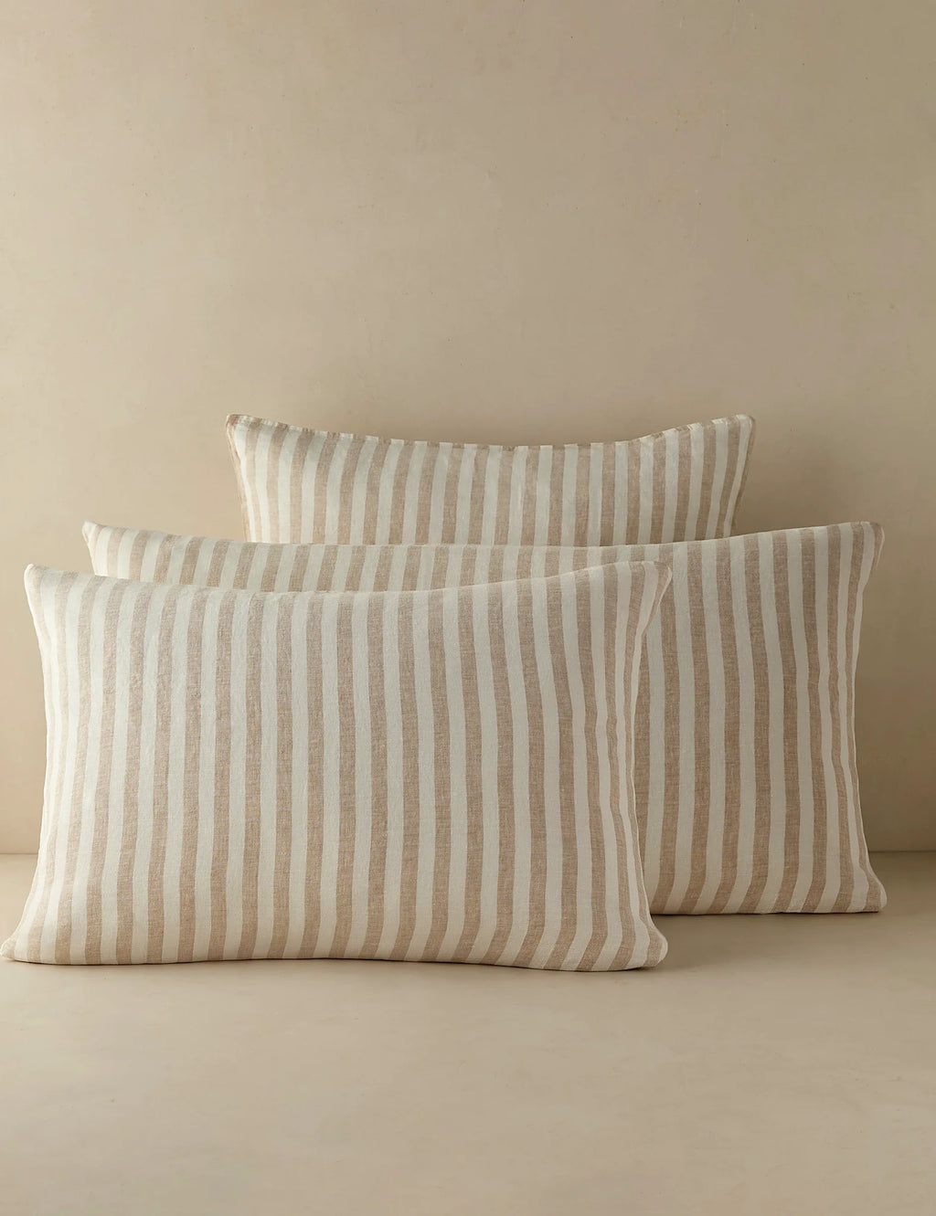 Group shot of striped linen shams in standard and euro sizes