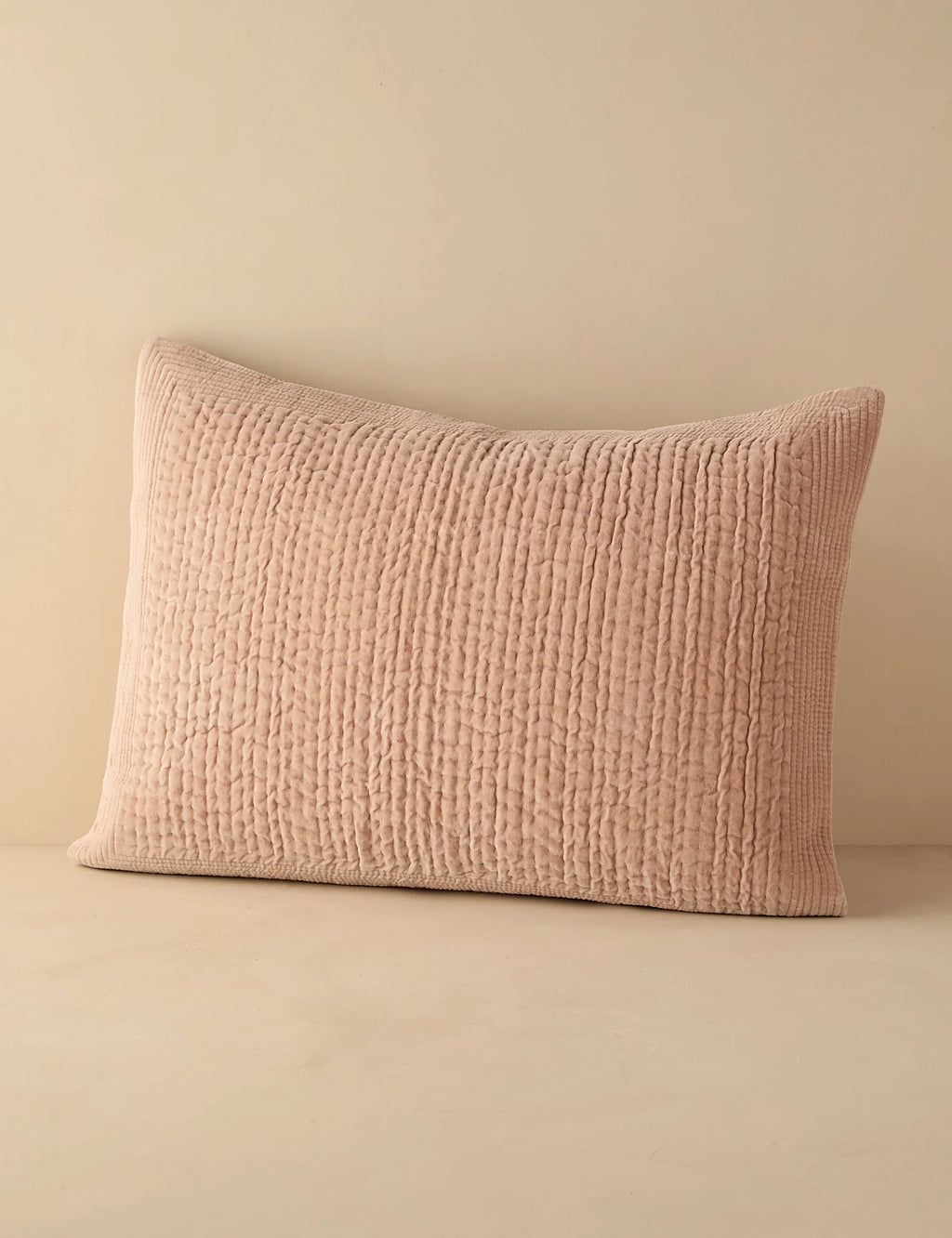 Blush quilted velvet sham in standard size photographed flat