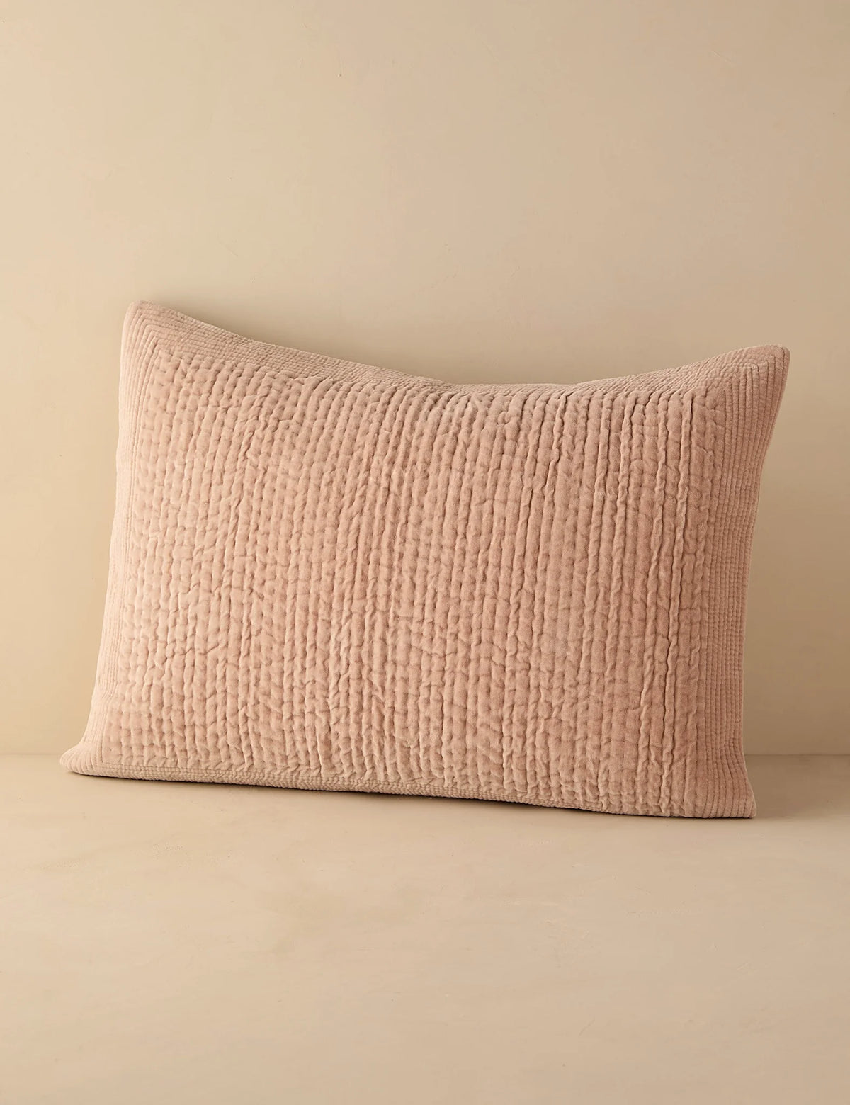 Blush quilted velvet sham in standard size photographed flat