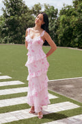 Front view of a floral maxi dress with a ruffled V neckline