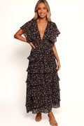 Front view of a black floral maxi dress with a deep V neckline